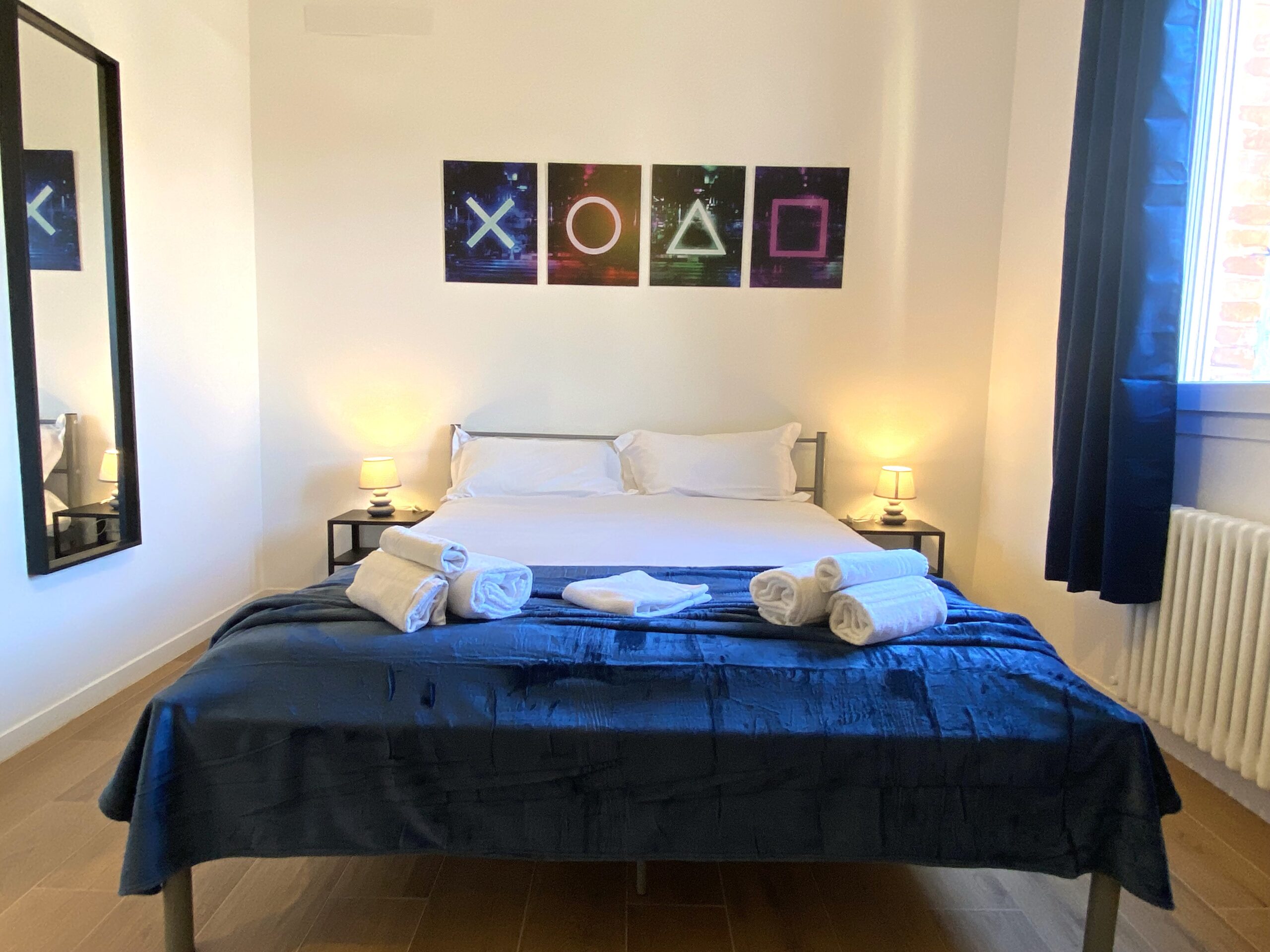 Stanza privata con bagno esterno, ideale per soggiorni brevi a Bologna. Urban Nest - appartamenti e case vacanze a Bologna