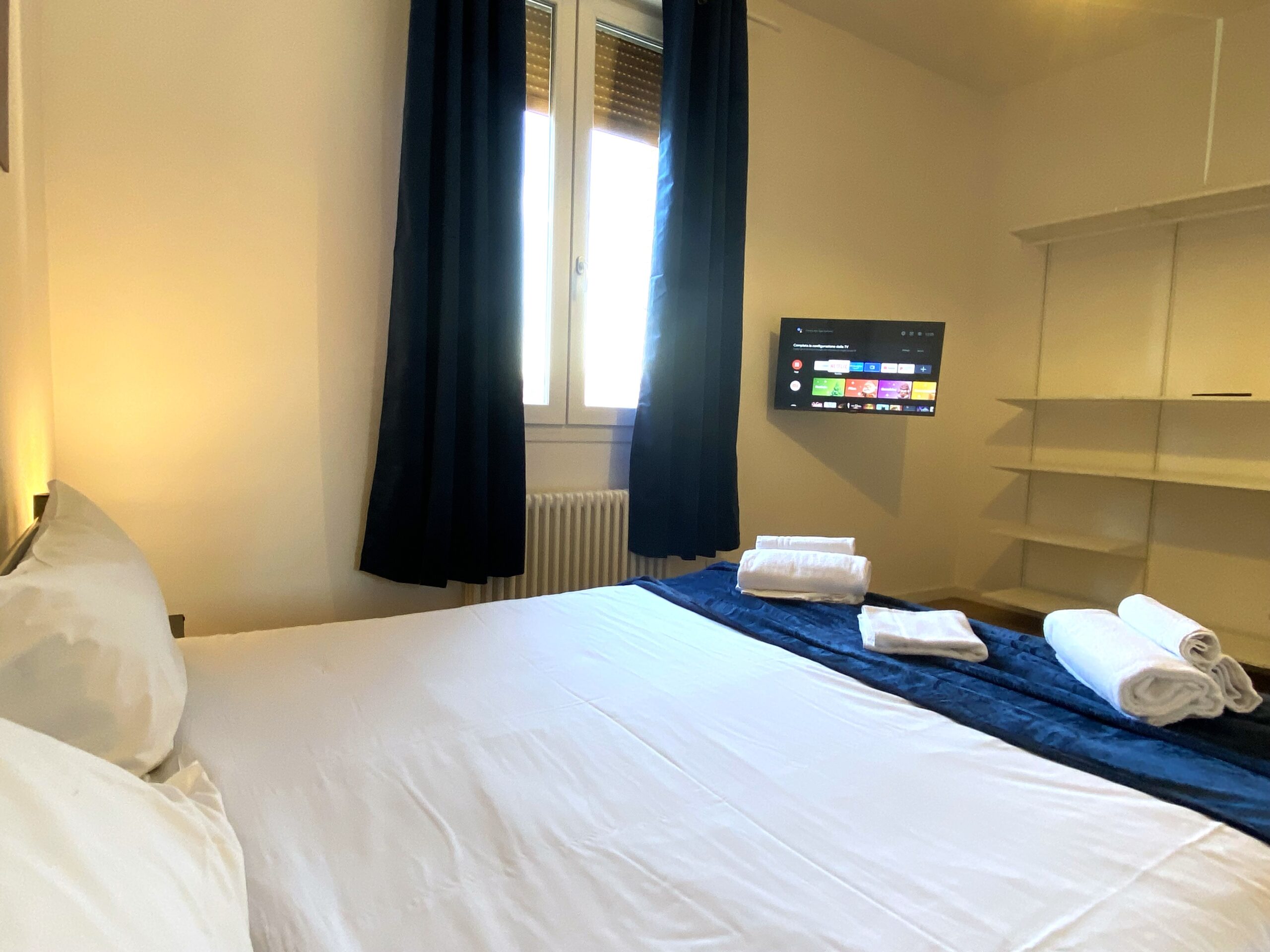 Stanza privata con bagno esterno, ideale per soggiorni brevi a Bologna. Urban Nest - appartamenti e case vacanze a Bologna