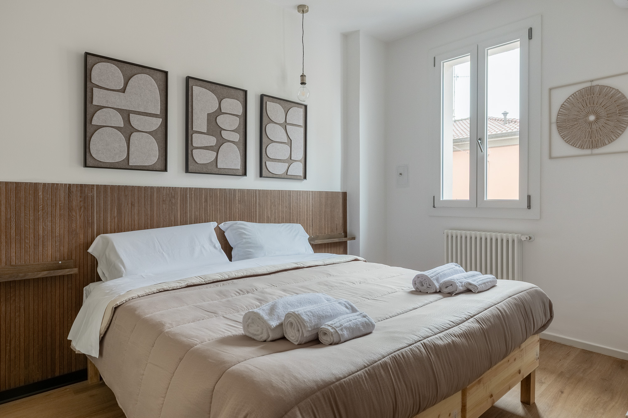Appartamento ristrutturato zona fiera con camera matrimoniale, soggiorno con divano letto e posto auto privato urban nest - appartamenti e case vacanze a Bologna