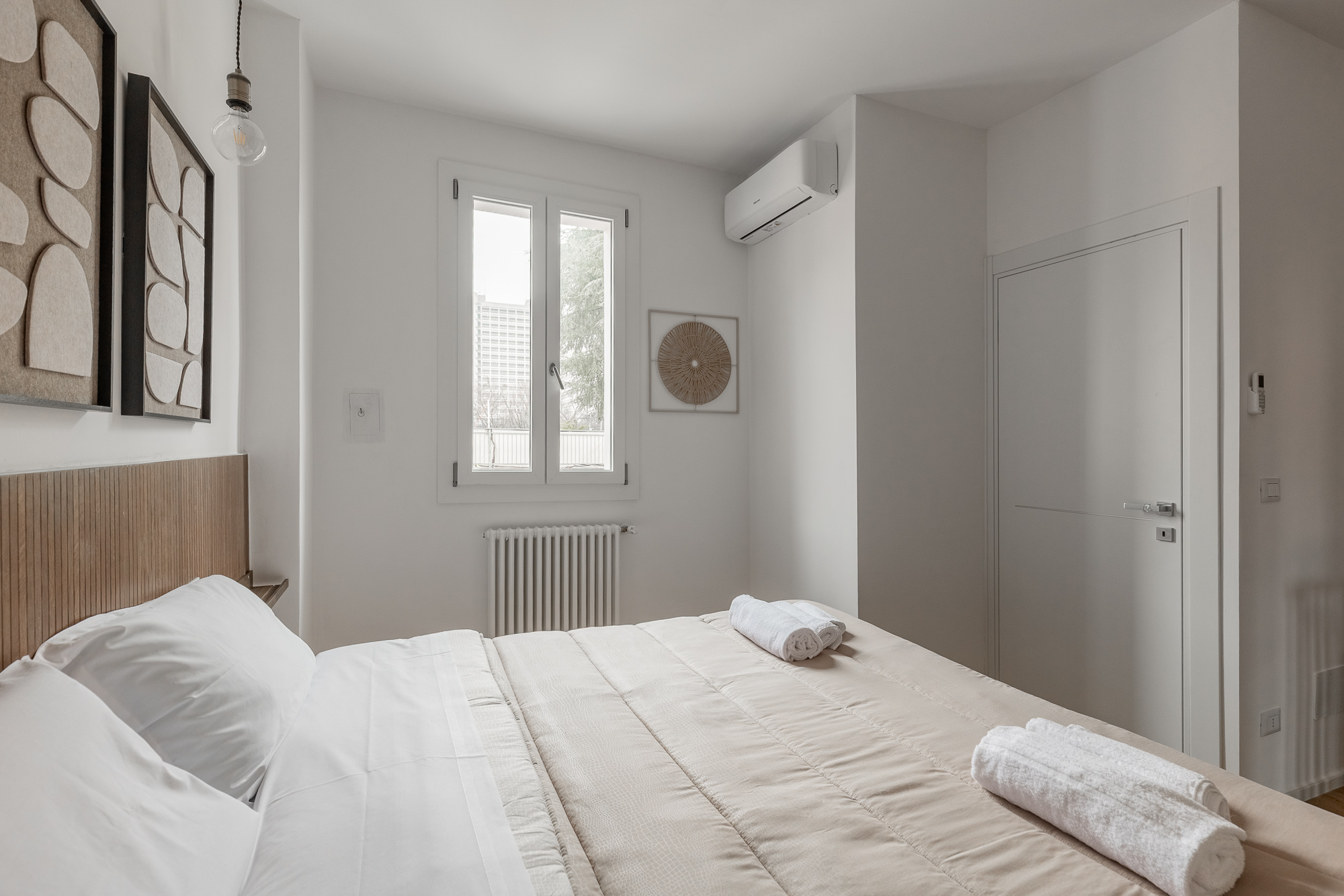 Appartamento ristrutturato zona fiera con camera matrimoniale, soggiorno con divano letto e posto auto privato urban nest - appartamenti e case vacanze a Bologna